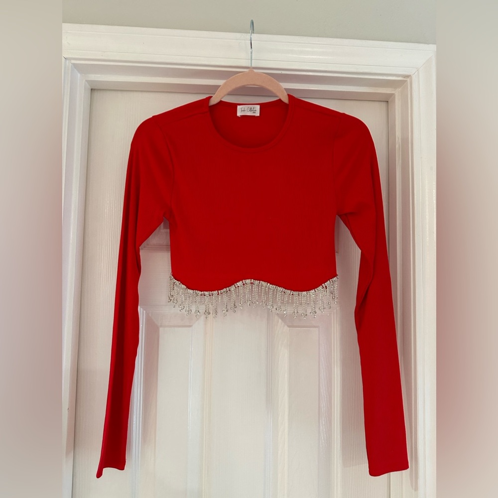 red long sleeve top with sparkle bottom